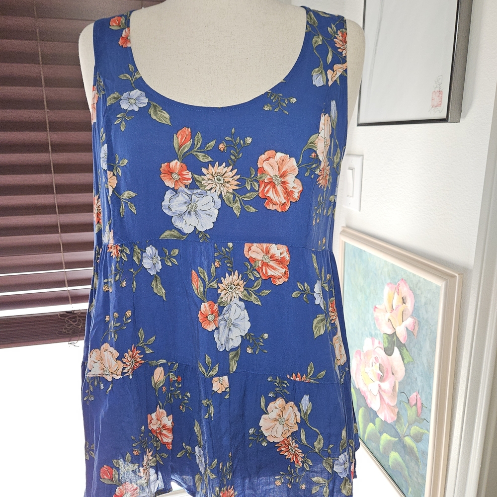 Floral Sleeveless Blouse in Blue by [Brand]